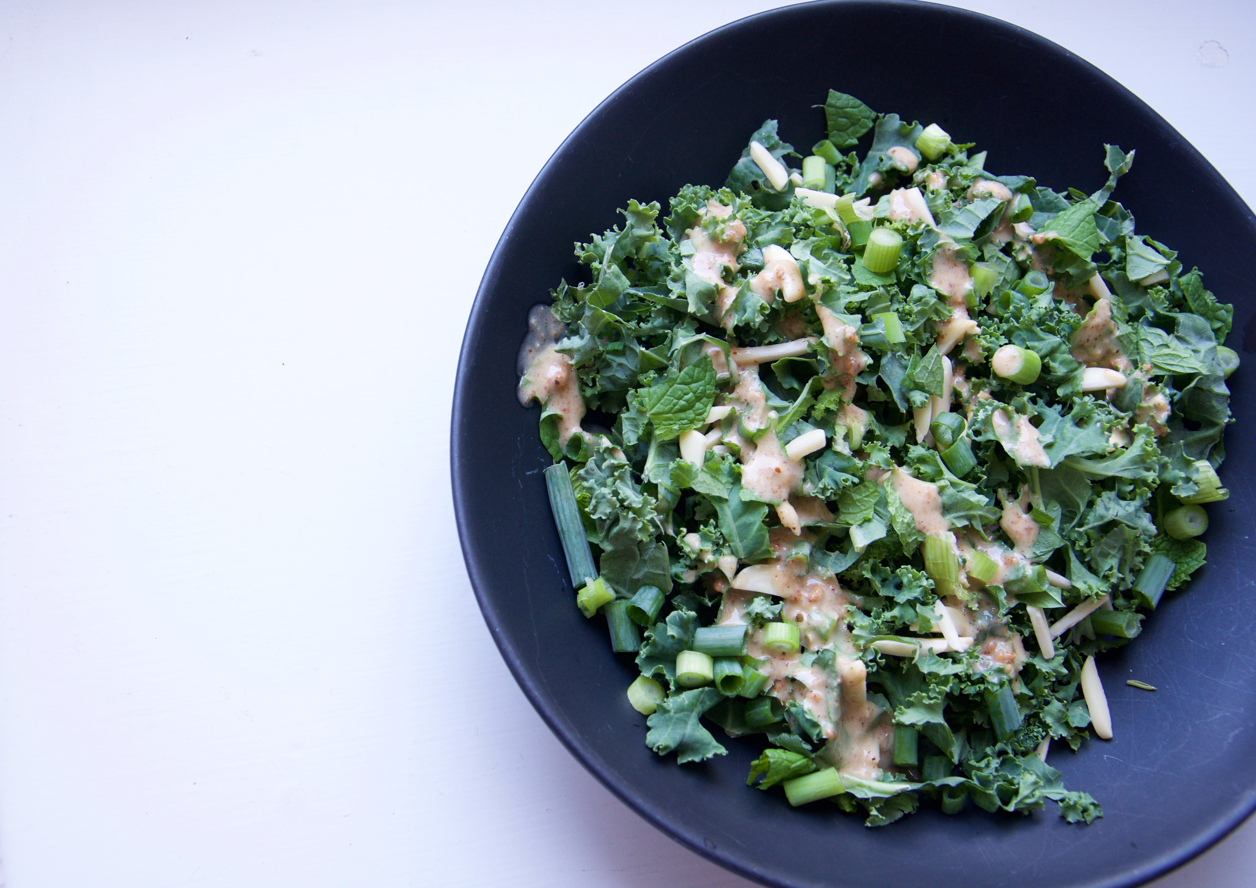 Kale Salad Recipe With Almond Butter Dressing 99th Monkey Natural
